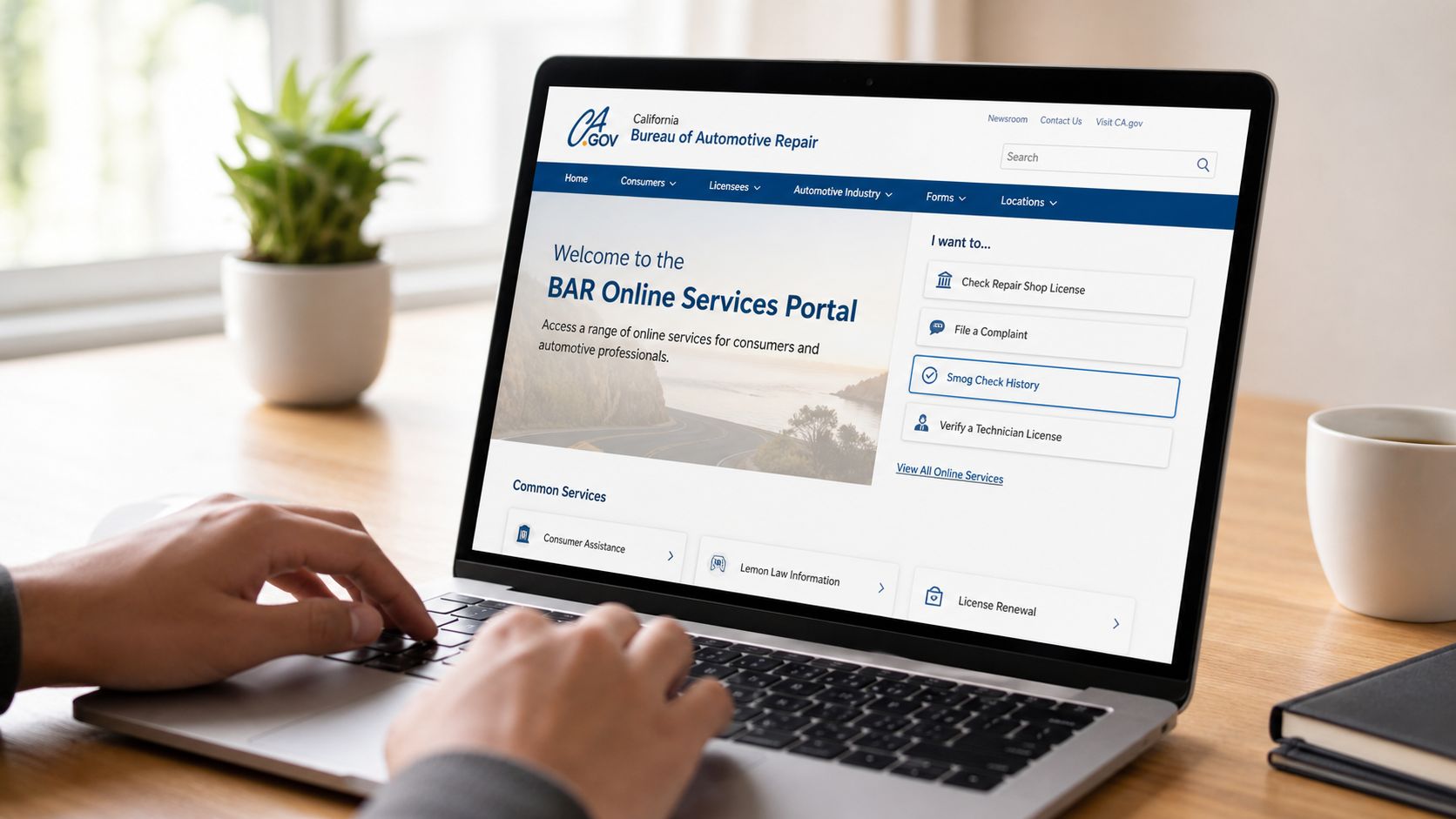 A person using a laptop to access the California Bureau of Automotive Repair online services portal.